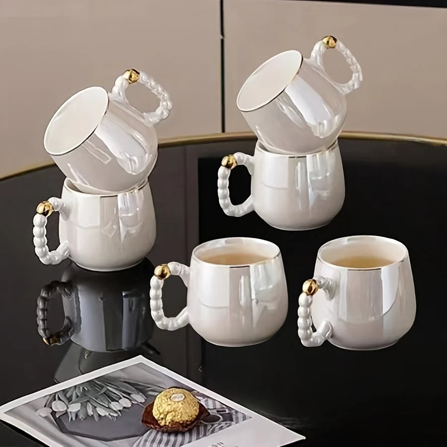 European Pearl White Glazed Porcelain Tea Service (Teapot, Sugar & Creamer)